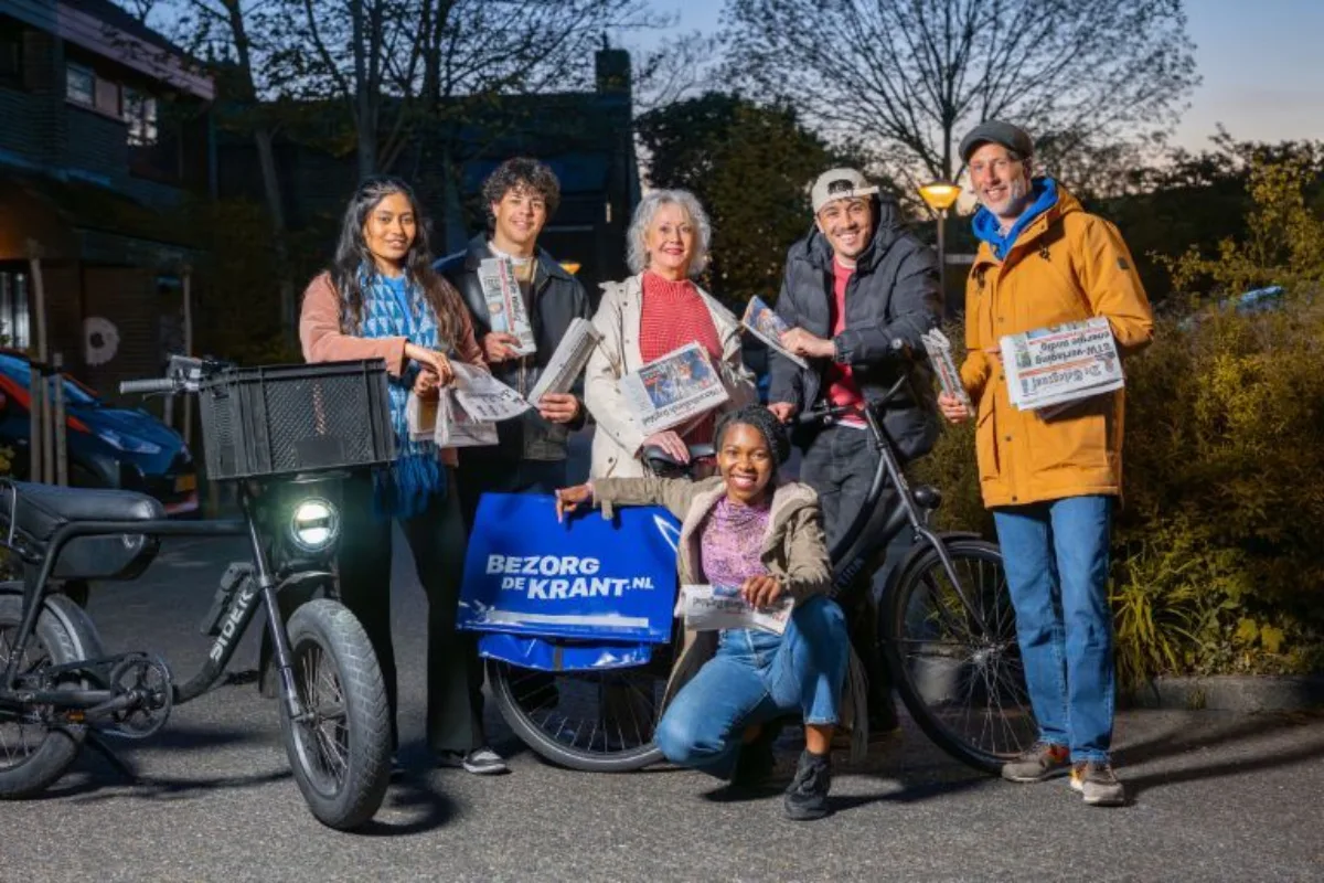 Header mobile homepage groepsfoto krantenbezorgers winter